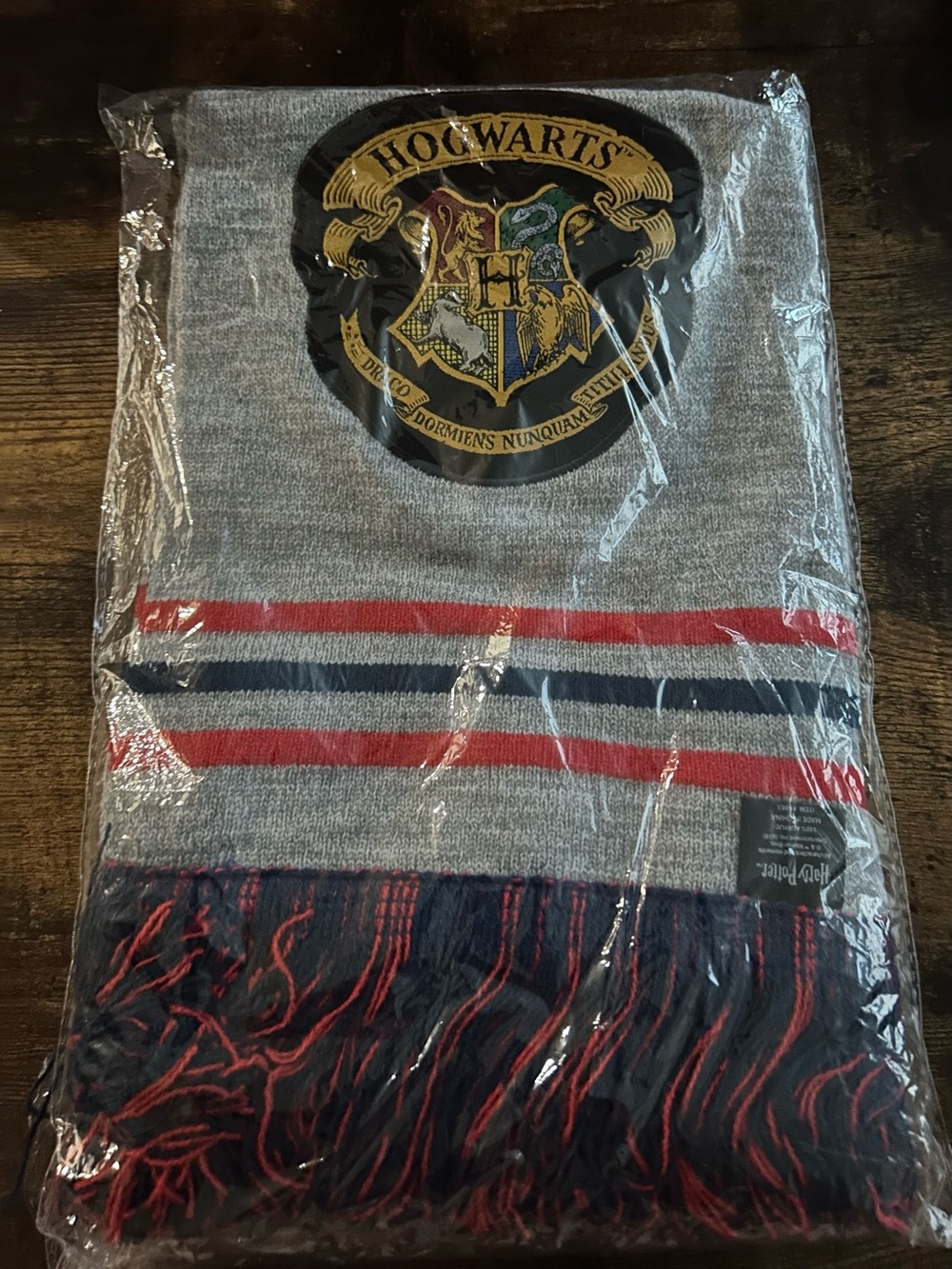 Warner Bros. Hogwarts Grey Knit Scarf with Red and Navy Stripes